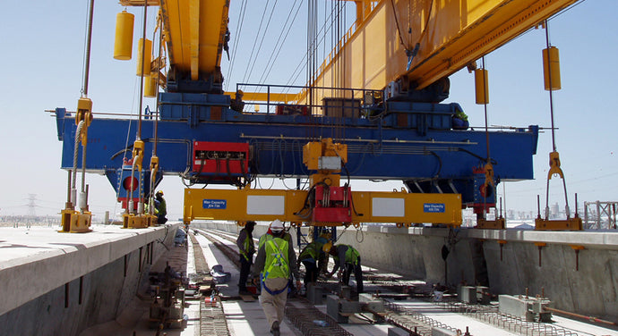 Twin-Girder Self-Launching Gantries for Precast Segmental Bridges